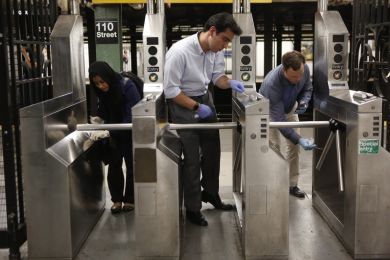 Chris Mason and students taking samples on the subway