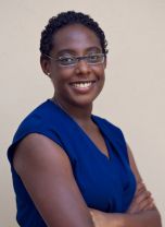 a woman smiling for a portrait