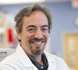 Dr. Ari Melinick A man posing for a photo