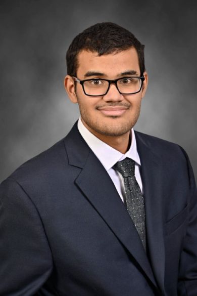 A headshot of Austin Carpenter